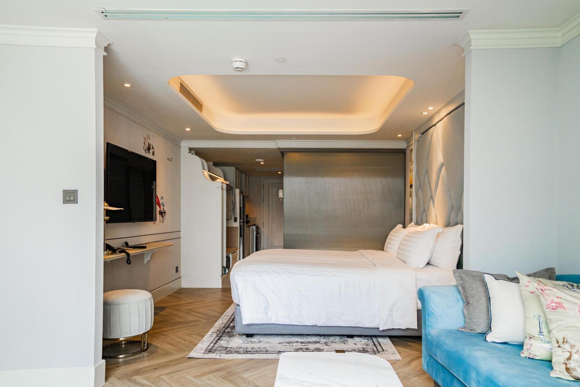 The Salil Hotel Riverside بانكوك المظهر الخارجي الصورة A bedroom at the hotel